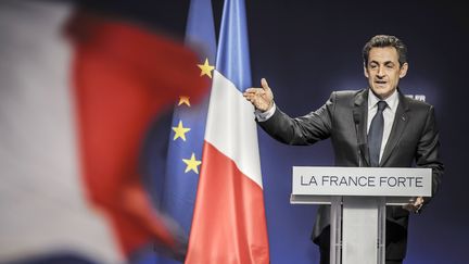 Nicolas Sarkozy en meeting pr&egrave;s de Lyon, le 17 mars 2012. (JEAN-PHILIPPE KSIAZEK / AFP)