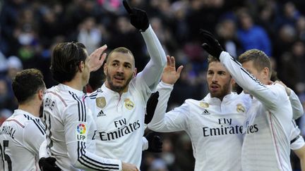 Benzema félicité par ses coéquipiers du Real Madrid (CURTO DE LA TORRE / AFP)