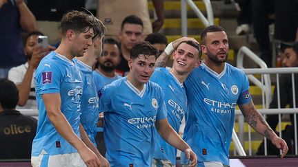 La joie des joueurs de Manchester City lors de la finale de la Coupe du monde des clubs contre Fluminense, à Djeddah (Arabie saoudite), le 22 décembre 2023. (GIUSEPPE CACACE / AFP)