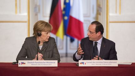 Angela Merkel et Fran&ccedil;ois Hollande, mercredi 19 f&eacute;vrier 2014, &agrave; l'issue d'un Conseil des ministres franco-allemand &agrave; Paris.&nbsp; (ETIENNE LAURENT / ANADOLU AGENCY)