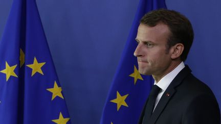 Emmanuel Macron à l'issue du mini-sommet de crise consacré aux migrants organisé à Bruxelles (Belgique), dimanche 24 juin 2018. (ARIS OIKONOMOU / AFP)