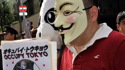 Les «Occupy Tokyo» déplorent aussi la mauvaise gestion de la crise liée à la tragédie de Fukushima. (AFP/YOSHIKAZU TSUNO)