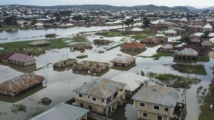 Illustration maisons inondées (HARUNA YAHAYA / AFP)