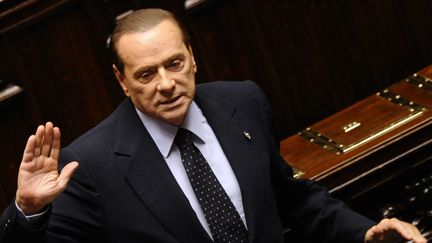 Le pr&eacute;sident du Conseil italien, Silvio Berlusconi, le 12 novembre 2011. (FILIPPO MONTEFORTE / AFP PHOTO)