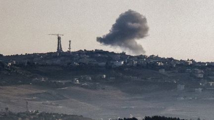 A cloud of smoke rises on the border between Lebanon and Israel, June 18, 2024. (JALAA MAREY / AFP)