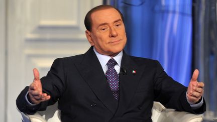 L'ancien pr&eacute;sident du Conseil italien Silvio Berlusconi &agrave; la t&eacute;l&eacute;vision RAI 1, le 9 janvier 2013. (TIZIANA FABI / AFP)