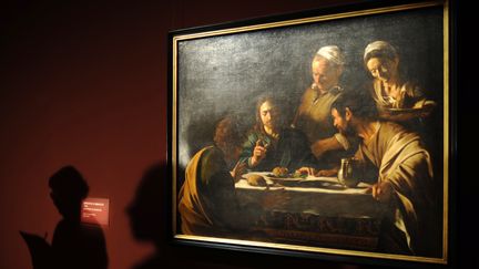 "Le repas d'Emma&uuml;s", c&eacute;l&egrave;bre toile du Caravage peinte en 1606, ici au mus&eacute;e des beaux-arts&nbsp;Pouchkine de Moscou (Russie). (VLADIMIR ASTAPKOVICH / RIA NOVOSTI / AFP)