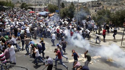 Des affrontements entre forces de l'ordre israéliens et Palestiniens à Jérusalem, le 21 juillet 2017. (MAHMOUD IBRAHEM / ANADOLU AGENCY)