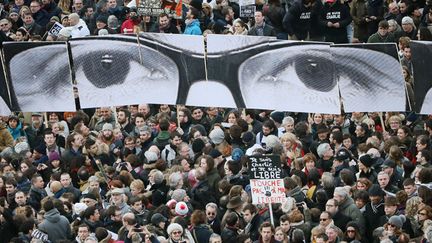 Le regard de Charb, victime de l'attentat contre Charlie Hebdo, dans la marche républicaine du 11 janvier 2015
 (Frederik Von Erichsen / Epa)