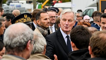 Le Premier ministre, Michel Barnier, lors d'un déplacement à Cournon (Puy-de-Dôme), le 4 octobre 2024. (MATTHIEU DELATY / HANS LUCAS / AFP)