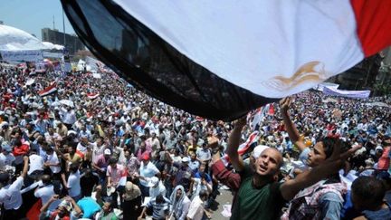 Près d'un millier d'Egyptiens manifestent à nouveau place Tahrir pour accélérer les réformes. (Auteur AFP-Mohamed Hossam)