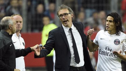 Laurent Blanc et Edinson Cavani, qui vient de se faire expulser au Stade de France (MARTIN BUREAU / AFP)