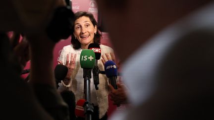 La ministre des Sports Amélie Oudéa-Castéra face aux médias à La Sorbonne, le 23 juin 2023. (FRANCK FIFE / AFP)