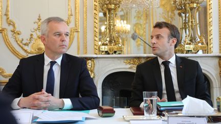 François de Rugy, ministre de la Transition écologique et solidaire, et Emmanuel Macron, le président de la République, à l'Elysée, le 23 mai 2019. (LUDOVIC MARIN / AFP)