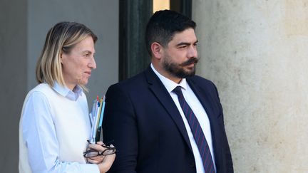 La ministre du Travail et de l'Emploi Astrid Panosyan-Bouvet et le ministre de la Fonction publique, de la rationalisation et de la transformation du secteur public Guillaume Kasbarian, le 23 octobre 2024. (ALAIN JOCARD / AFP)