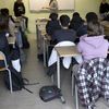 Une salle de classe et des élèves dans un collège à Béziers (Hérault), le 22 mars 2024. (GUILLAUME BONNEFONT / MAXPPP)