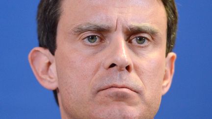 Le ministre de l'Int&eacute;rieur, Manuel Valls, &agrave; Evry (Essonne), le 27 mars 2013.&nbsp; (MIGUEL MEDINA / AFP)