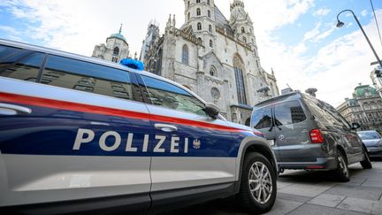 A police car drives through the streets of Vienna, Austria, on December 24, 2023. (MAX SLOVENCIK/APA)