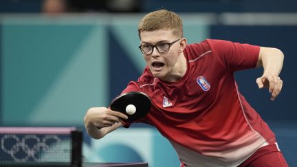 Alexis Lebrun lors du tournoi olympique de tennis de table, le 31 juillet 2024, à Paris. (AFP)