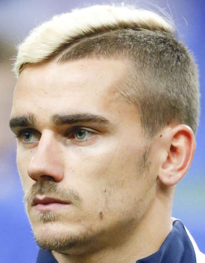 Sous la mèche, Antoine Griezmann. (STEPHANE ALLAMAN / AFP)