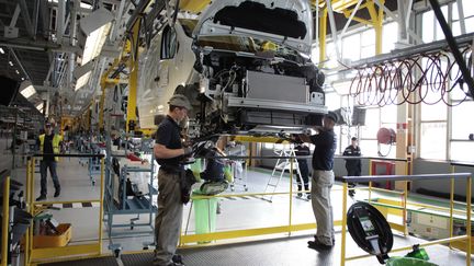 Renault va verser une "prime Macron" de fin d'année à ses salariés. (CHARLY TRIBALLEAU / AFP)