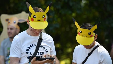 Des visiteurs au festival Pokémon GO, le 4 juillet 2019, à Dortmund (Allemagne).&nbsp; (INA FASSBENDER / AFP)