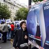 Affiches représentant Philippe Pétain et Marine Le Pen portant l'inscription "Travail, Famille, Patrie, Stop au F-Haine" et "Liberté, Égalité, Fraternité, nous sommes tous des étrangers !", lors d'une manifestation contre l'extrême droite, le 15 juin 2024 à Paris. (FRANCOIS GOUDIER / GAMMA-RAPHO)