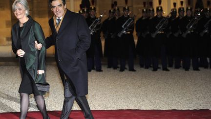 François Fillon et son épouse, Pénélope, à l'époque où il était Premier ministre. (LIONEL BONAVENTURE / AFP)