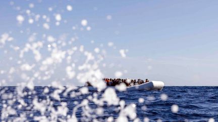 Migrants on a boat near the Libyan coast, February 9, 2020. (PABLO GARCIA / AFP)