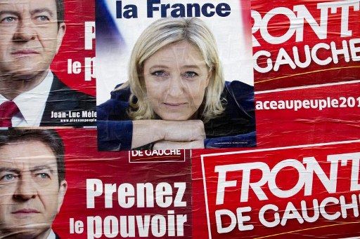 Les affiches de Marine Le Pen et Jean-Luc Mélenchon en avril à Paris (JOEL SAGET / AFP)