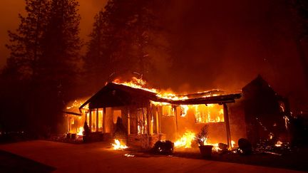 Une maison incendiée à Paradise (Californie), le 8 novembre 2018. (JUSTIN SULLIVAN / GETTY IMAGES NORTH AMERICA / AFP)