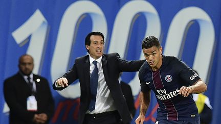 Hatem Ben Arfa en plein effort sous les yeux de son entraîneur Unaï Emery (FRANCK FIFE / AFP)