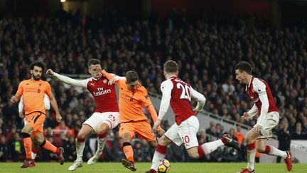 Roberto Firmino a marqué le but du 3-3 pour Liverpool (IAN KINGTON / AFP)