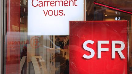 L'op&eacute;rateur SFR va &ecirc;tre vendu au groupe Altice/Numericable. (ERIC PIERMONT / AFP)