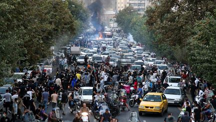 Des manifestation à Téhéran (Iran), le 21 septembre 2022. (ANADOLU AGENCY / AFP)