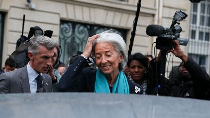 &nbsp; (Christine Lagarde sortant de la CJR en 2013, après une douzaine d'heures d'audition. © Maxppp)