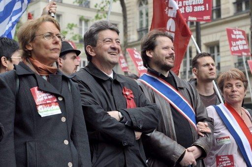 Martine Billard, Jean-Luc Mélenchon, François Delapierre (g à d) défilent à Paris, le 1er mai 2010. (AFP - Bertrand Langlois)