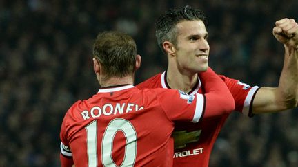 Wayne Rooney et Robin van Persie ont tous les deux marqué lors la large victoire de Manchester United devant Hull City (3-0).