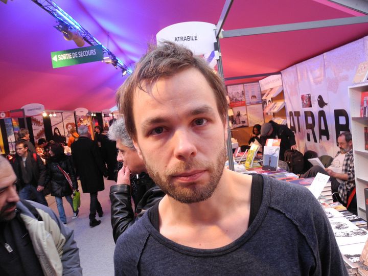 Ville Ranta devant le stand de l'éditeur Racham.
 (LCA/Culturebox)