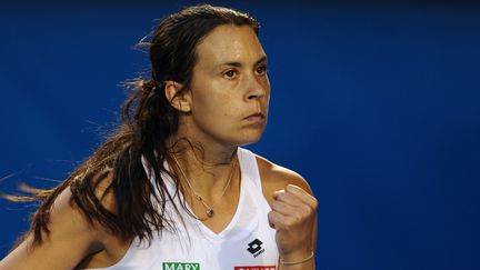 Marion Bartoli, qualifi&eacute;e pour le troisi&egrave;me tour de l'Open d'Australie, le 19 janvier 2012, &agrave; Melbourne (Australie). (NICOLAS ASFOURI / AFP)