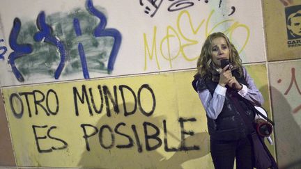 Militante altermondialiste à Madrid en lutte contre la cherté des loyers   (Reuters/ Juan Medina)