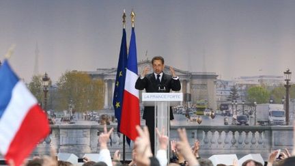 Nicolas Sarkozy lors de son discours place de la Concorde, à Paris, le 15 avril 2012. (AFP - Kenzo Tribouillard)