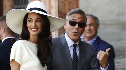 George Clooney et Amal Alamuddin après leur mariage officiel à Venise, lundi 29 sept 2014.
 (Pierre Teyssot / AFP)