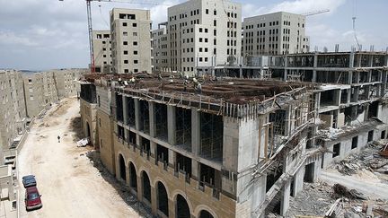 rappelle Modiin, ville israélienne construite en 1993. Résultat, son concepteur est accusé de l’avoir conçu comme une colonie de peuplement.
 
 
 (AFP PHOTO / THOMAS COEX)