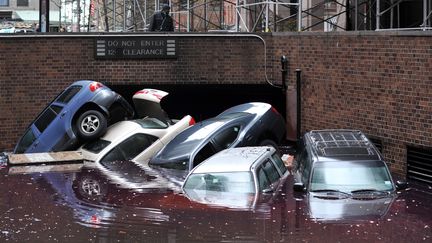 Des milliers de m&egrave;tres cubes d'eau sal&eacute;e se sont d&eacute;vers&eacute;s dans les stations et les tunnels lorsque les eaux sont brutalement mont&eacute;es en raison de Sandy lundi soir.&nbsp; (STAN HONDA / AFP)