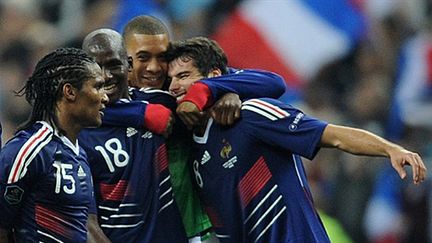 Malouda, Diarra, Hoarau et Gourcuff ont le sourire (FRANCK FIFE / AFP)