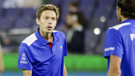 Nicolas Mahut lors du double avec Arthur Rinderknech contre l'Allemagne, le 14 septembre 2022. (FRANK MOLTER / DPA)