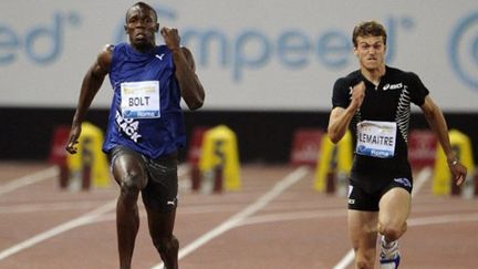 Usain Bolt à la lutte avec Christophe Lemaitre