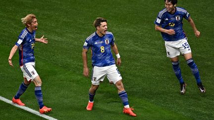 La joie de Ritsu Doan, buteur face à l'Allemagne lors de la Coupe du monde, le 23 novembre 2022. (ANNE-CHRISTINE POUJOULAT / AFP)