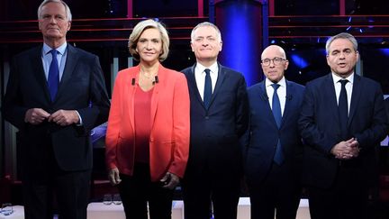 Quel est le bon style à adopter, lorsque l'on est candidat à la présidentielle ? Pour 2022 la tendance est sans aucun doute au "le plus neutre possible". (BERTRAND GUAY / POOL)